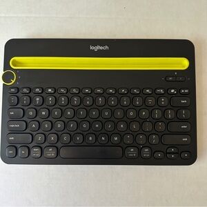 Logitech Black Keyboard with Yellow Slot
